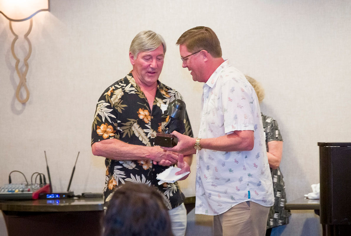 Eric Ceithaml, MD receiving his own Ceithaml Survivor award from Jerry Bridgham, MD